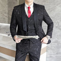 Men's slim fit three-piece wedding suit set in white and black with embossed fabric, jacket, vest, and trousers