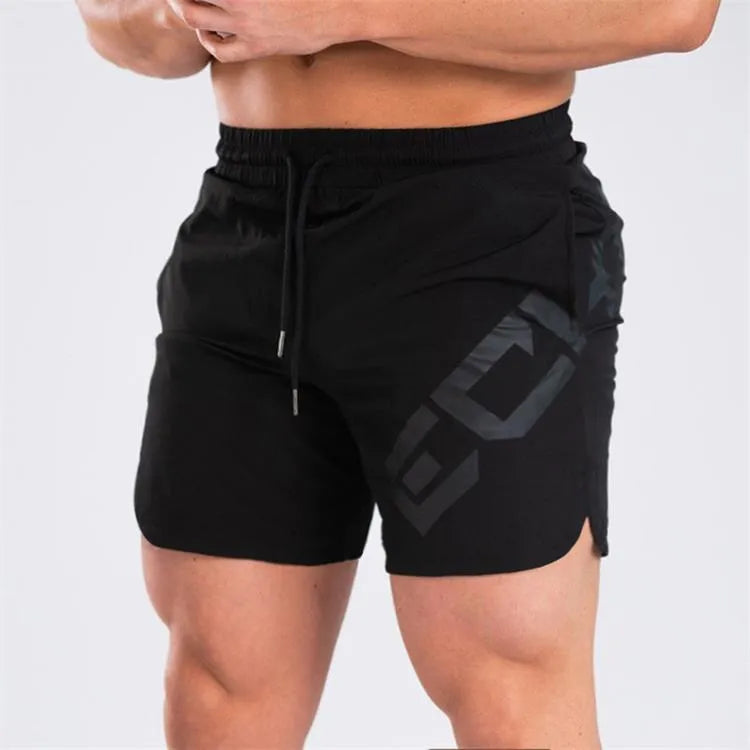 Men's black elastic waist knee-length quick-dry training shorts on a white background.