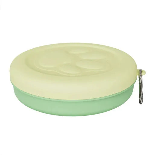Collapsible silicone portable dog bowl in green and pink colour options