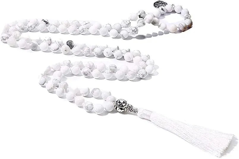 Handmade knotted beaded necklace with stone pendant showing 108 beads and geometric design
