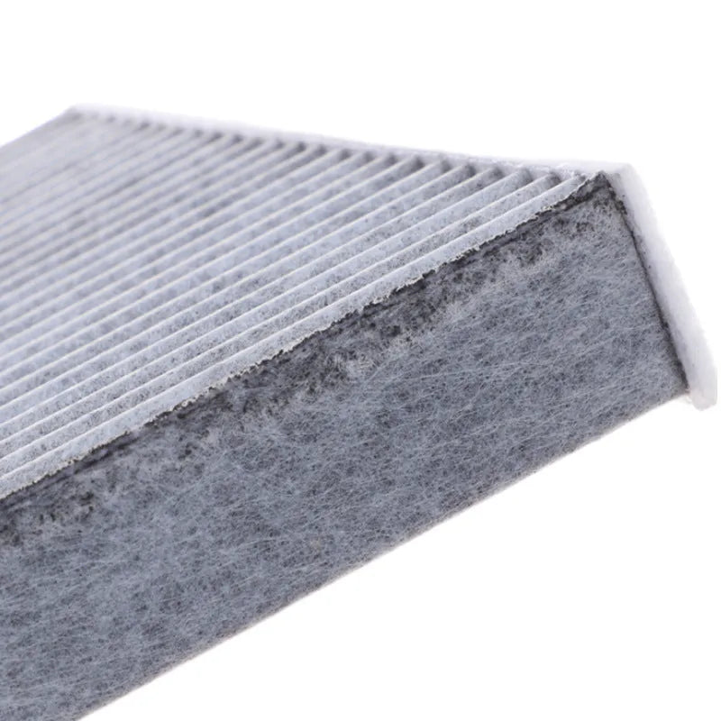 Grey grid-style car air conditioning filter element measuring 215x210x30mm for Geely vehicles