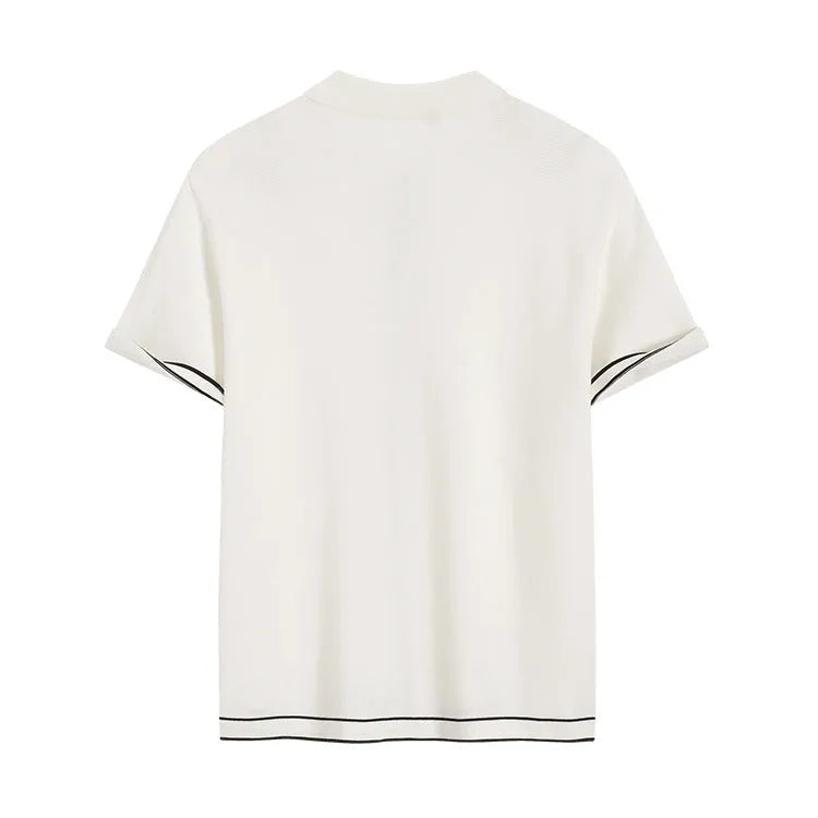 White women's cardigan with contrast lapels and short sleeves on hanger