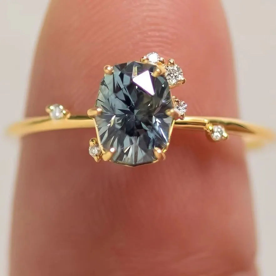Gold plated floral ring with green zircon stones in women's fashion jewellery design