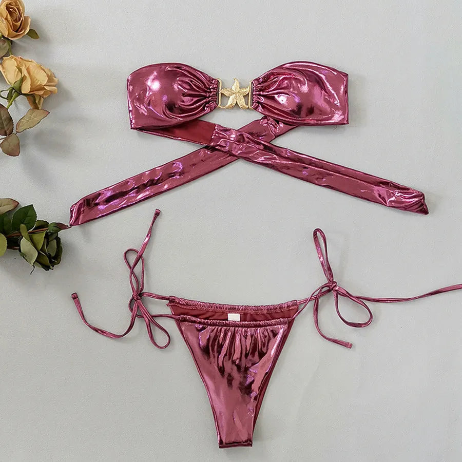 Glossy sapphire blue women's tube top bikini with a gold starfish decoration on the briefs.