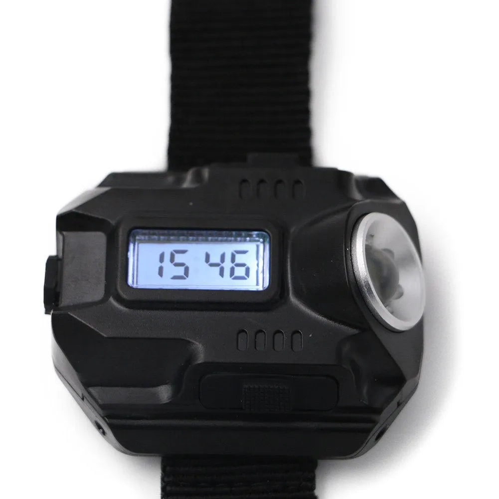 Black LED watch flashlight on wristband with compass and time display