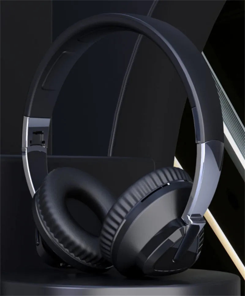 H3 Wireless Bluetooth over-ear headset with all-inclusive ear cups in black, shown with AUX cable.