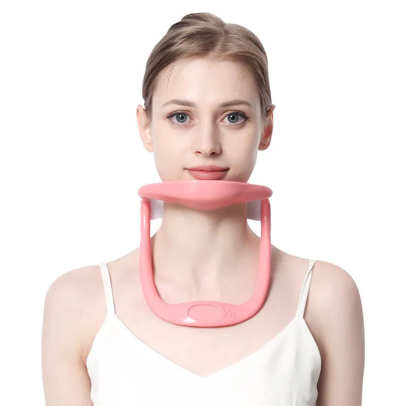 White PP plastic neck and shoulder support brace for posture correction on a grey background.