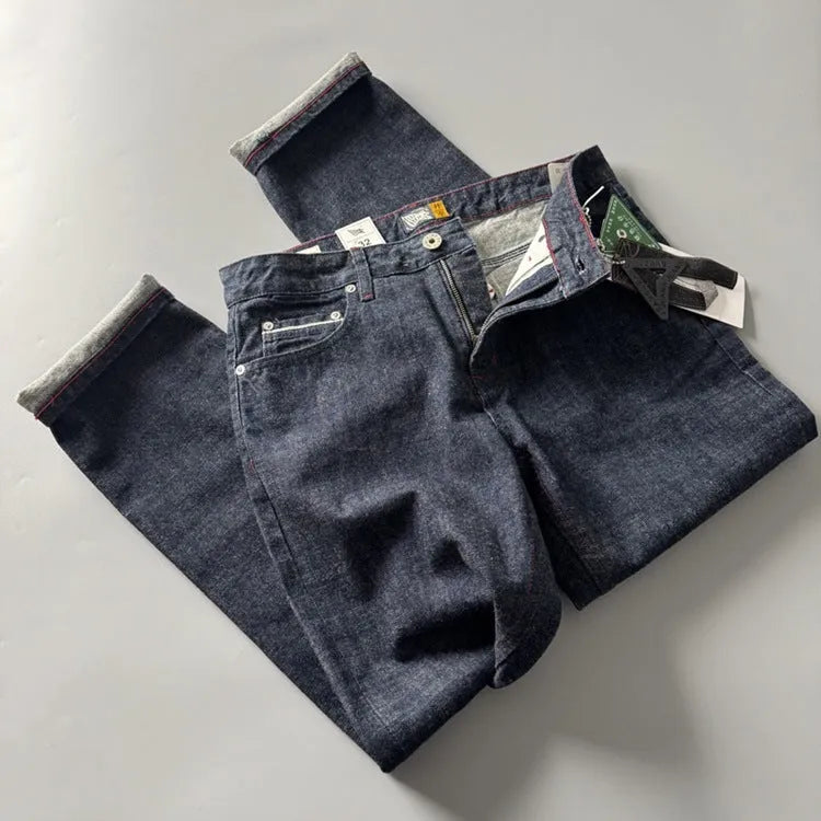 Men's primary colour straight-leg denim jeans with a mid-waist, shown on a size chart.
