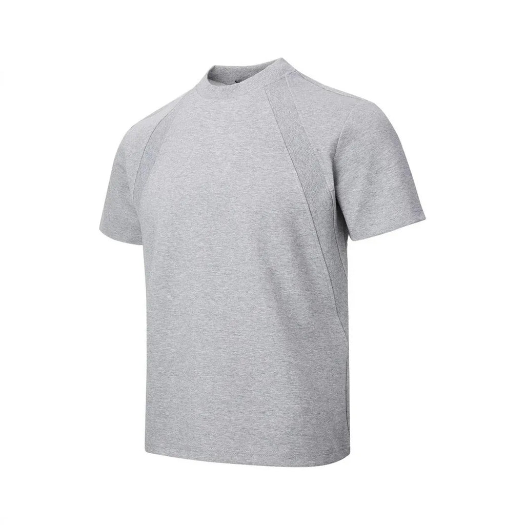 Short sleeve polyester top with textured air layer stitching in a loose fit.