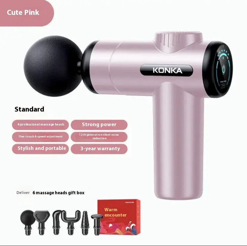 Konka V19 grey mini electric massage gun with multiple attachment heads on a table