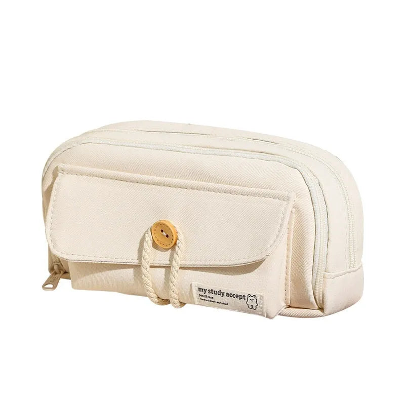 Korean style canvas pencil case in green holding multiple pens
