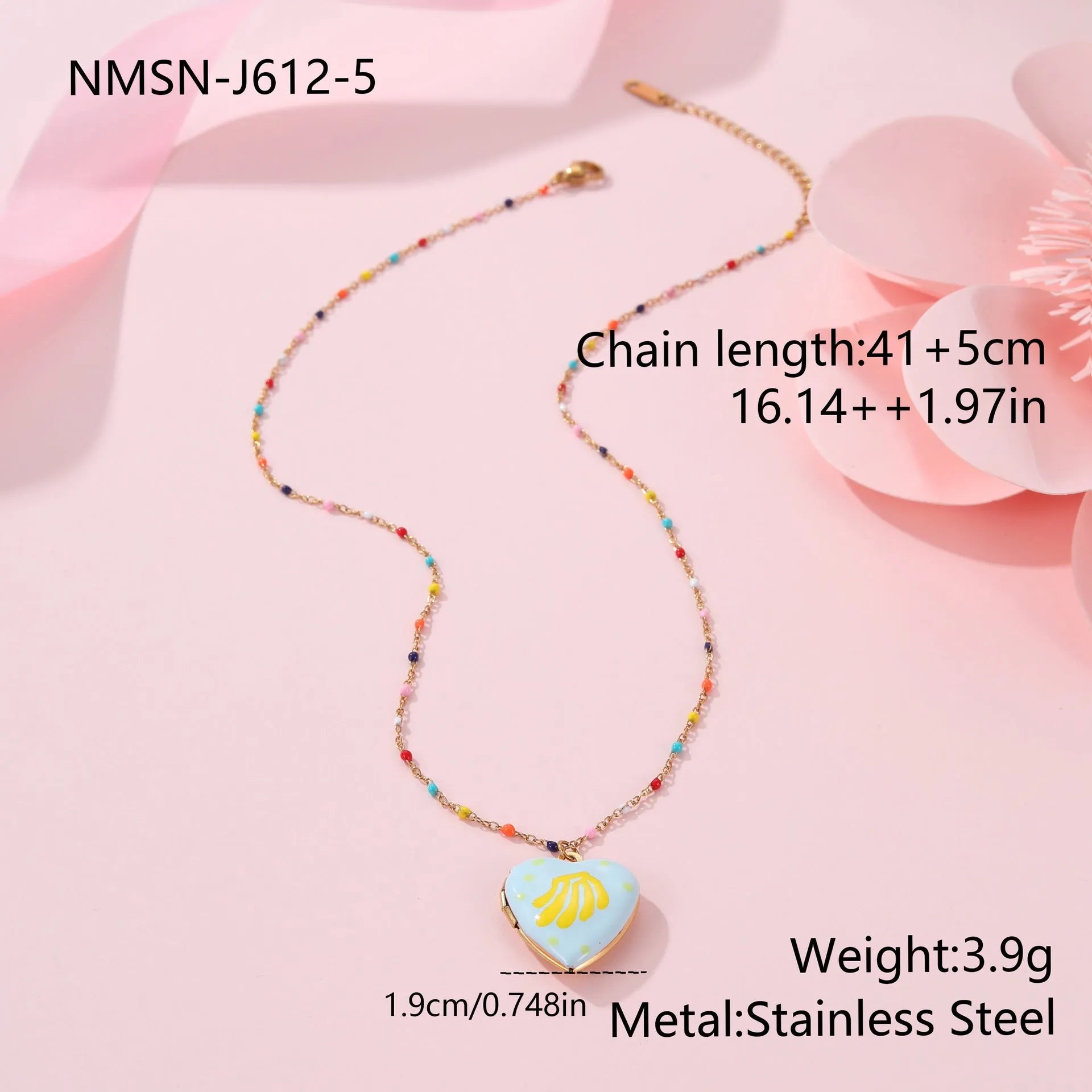 Gold-plated heart-shaped fruit pendant necklace on a stainless steel chain, showing grape design detail.