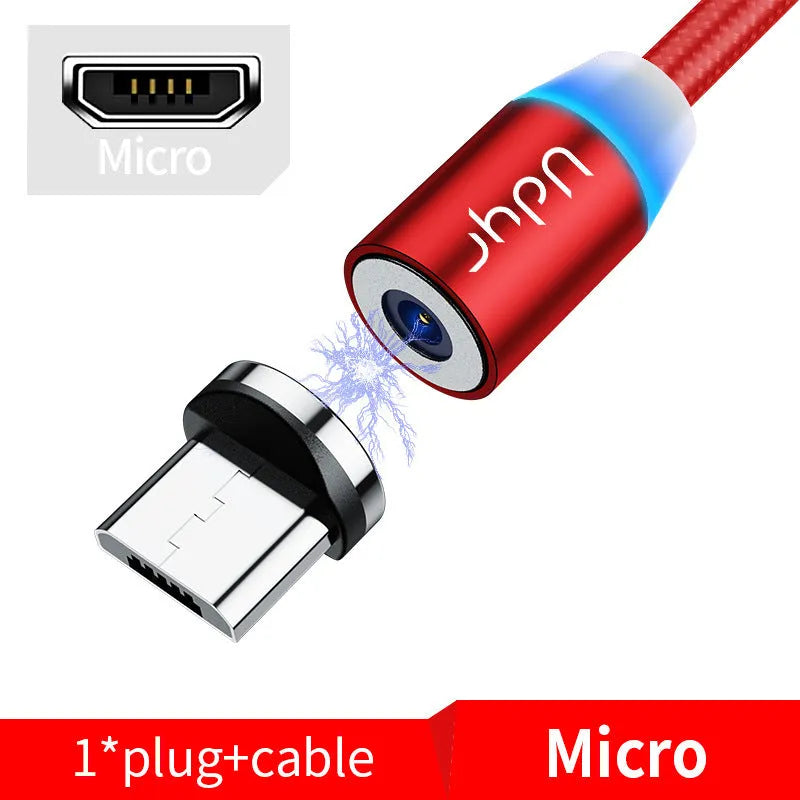 Black magnetic data cable with interchangeable Apple, Android, and USB-C magnetic heads on a table.