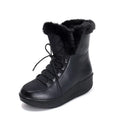 Black women's lace-up winter boots with a platform sole on a white background.