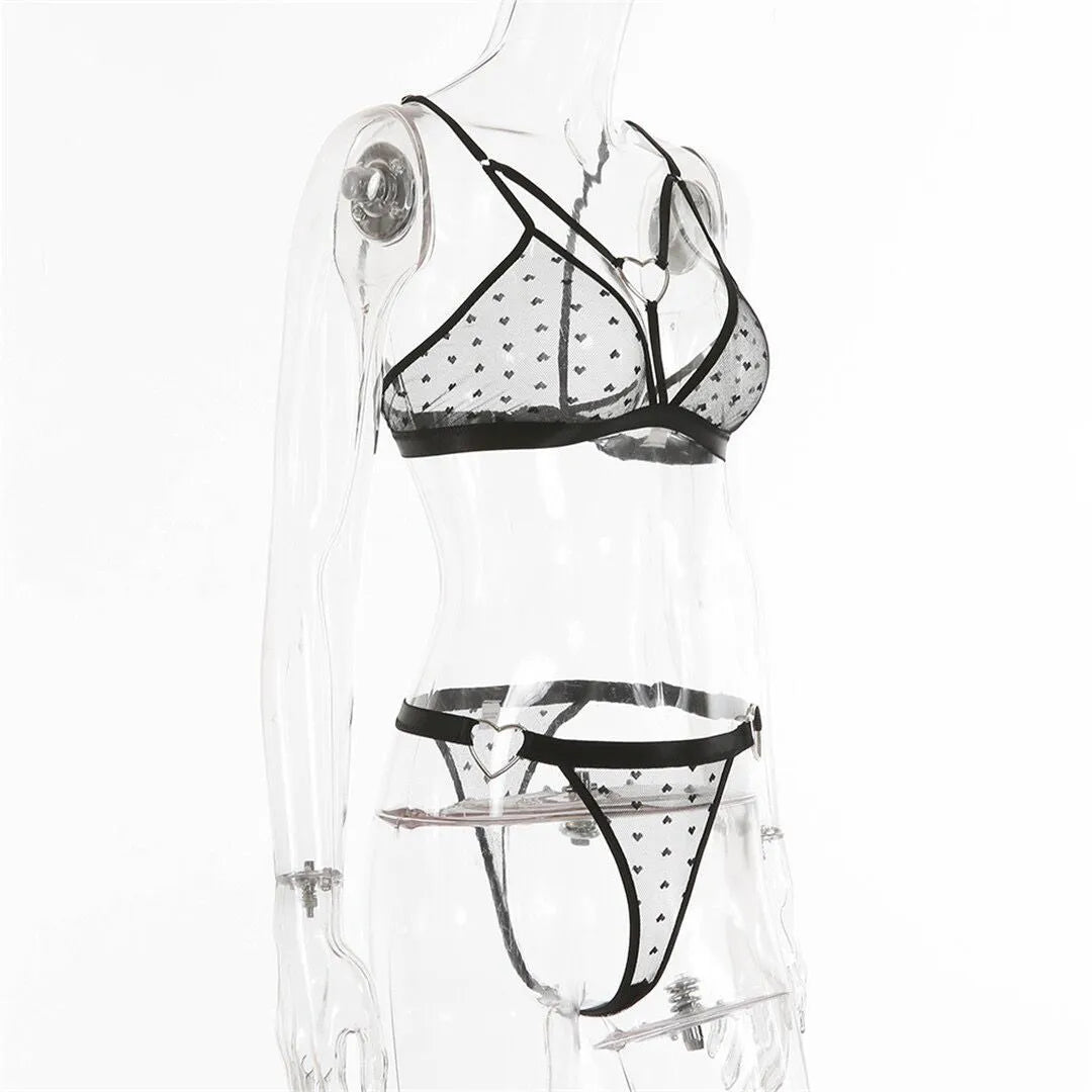 Ladies' black mesh spandex two-piece set comprising a top and trousers