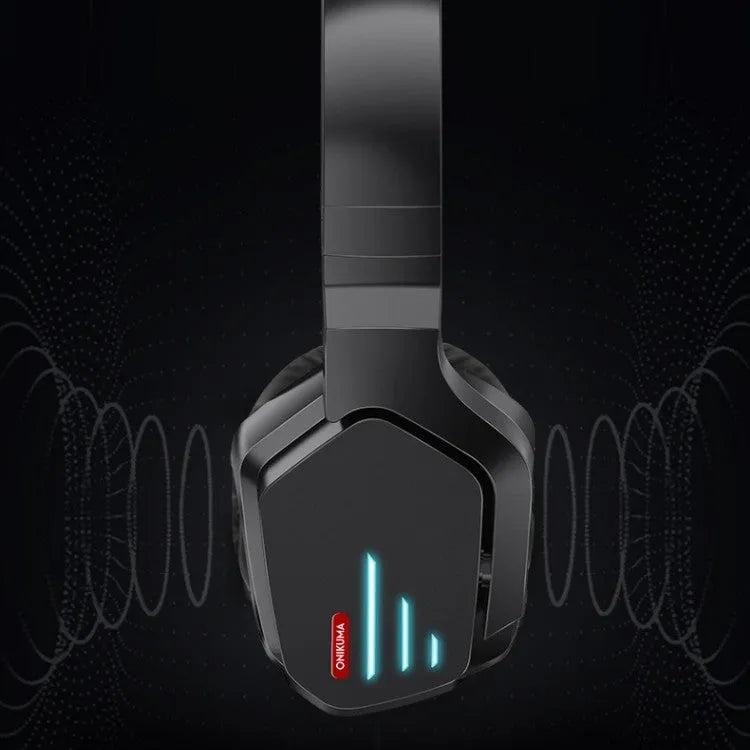 Luminous black wireless gaming headphones showing head-mounted design and included 3.5mm cable.