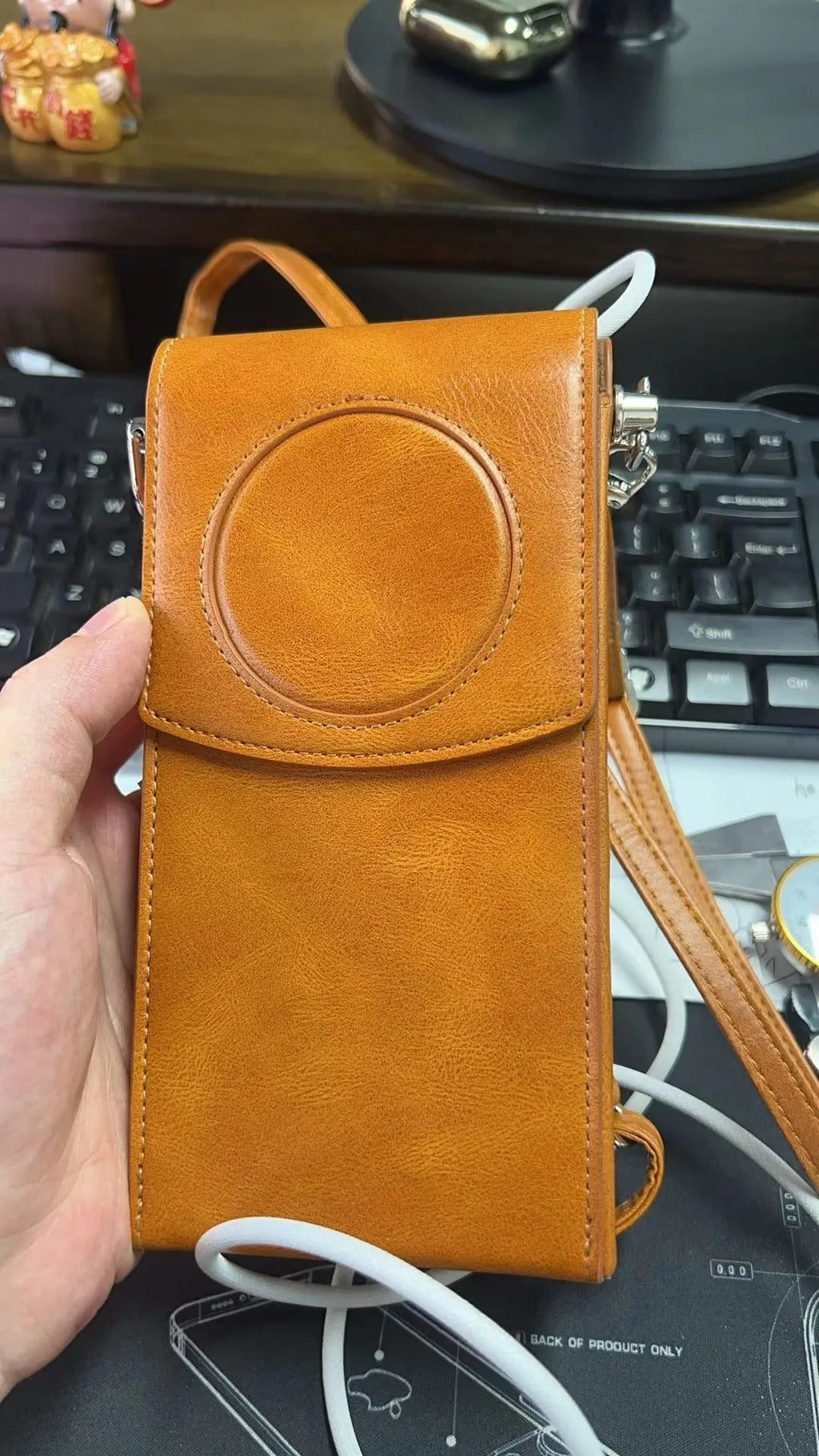 Brown leather storage bag for Apple Vision Pro power supply