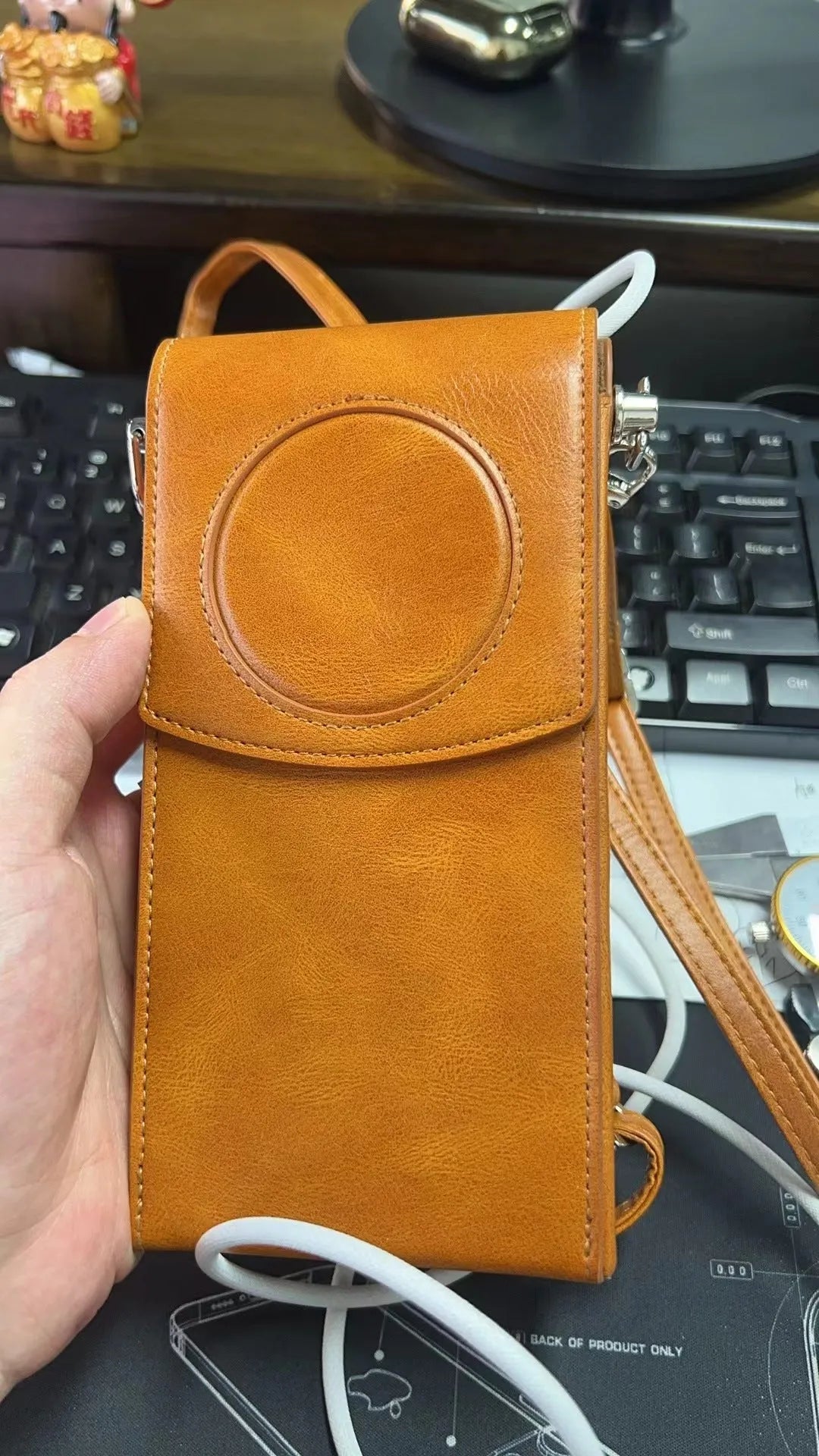 Brown leather storage bag for Apple Vision Pro power supply
