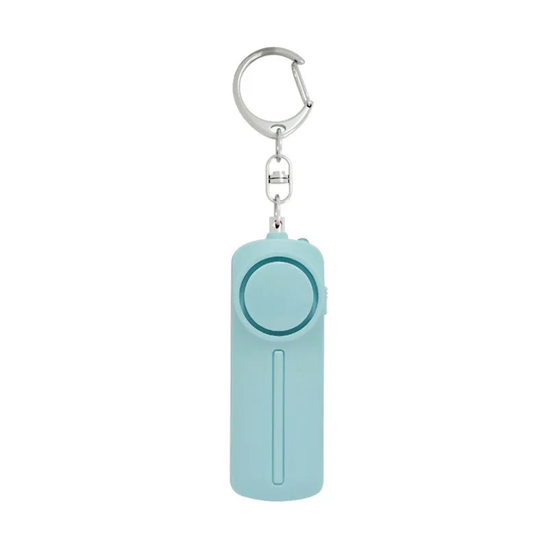 Compact pink personal safety alarm with keyring, labelled 130 dB.