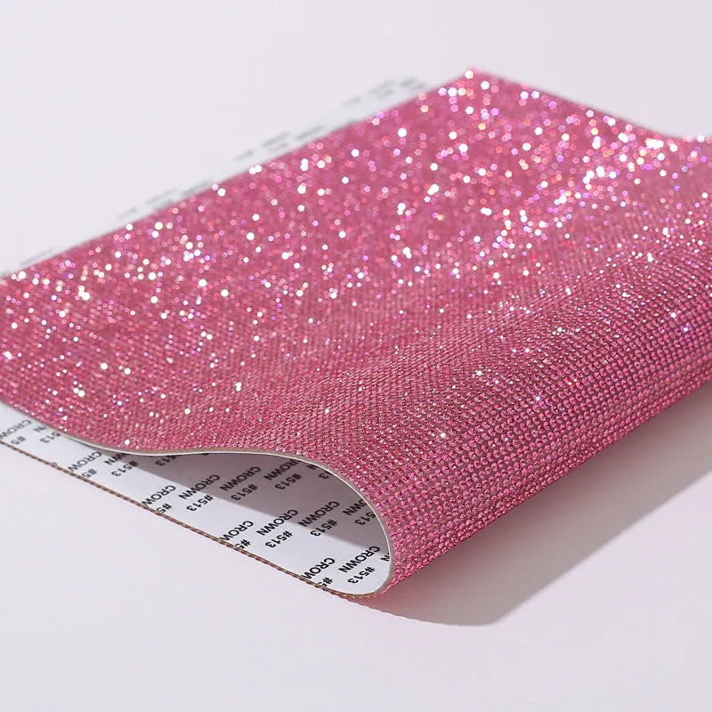 Rhinestone adhesive sheet with eight-eye pattern in multiple colour options on white background
