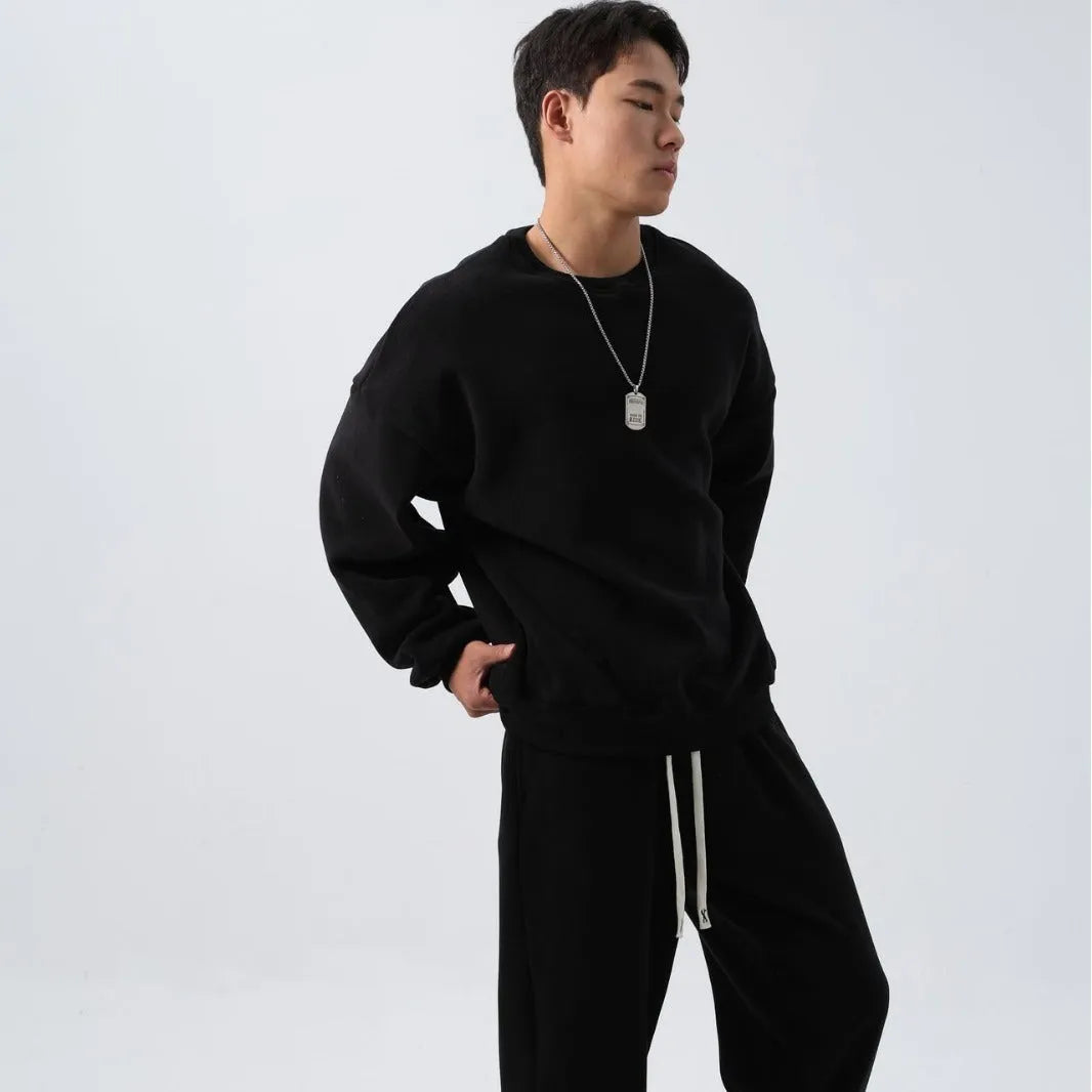 Men's polar fleece winter sports suit in five colour options showing crew neck top and matching trousers