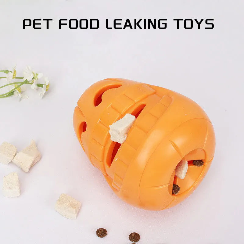 Halloween pumpkin shaped orange interactive dog chew toy with treat-dispensing funnel