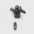 Resin character wall hanging wall decoration in modern simple style copper colour left facing