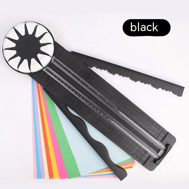 Pink plastic 12-in-1 multifunctional paper cutter with dotted guide lines on a white surface.