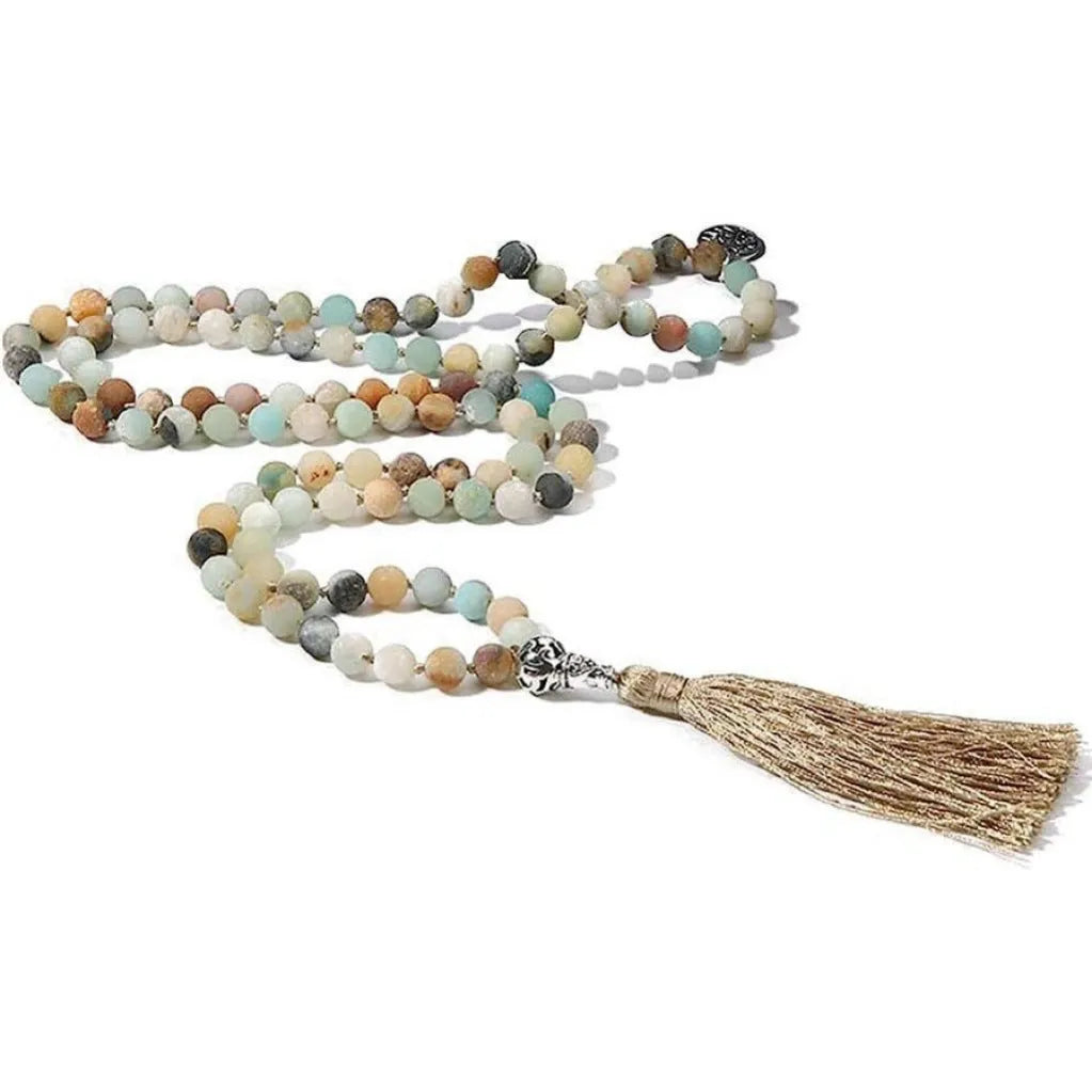Handmade knotted beaded necklace with stone pendant showing 108 beads and geometric design