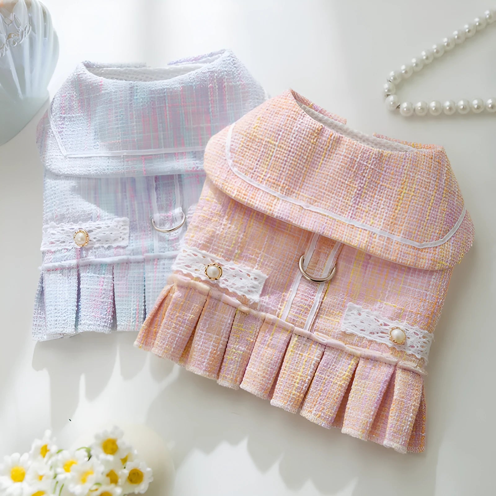 Polyester pet clothes for small dogs and cats in purple and pink colours with four size options