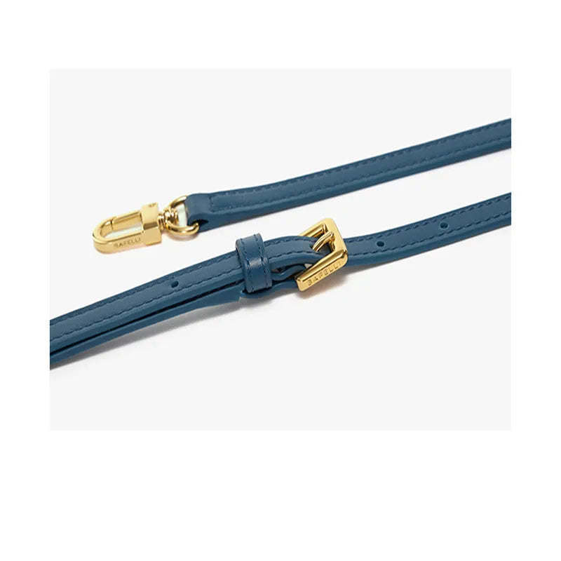 Leather wing bag with latch closure and buckle detailing in cow leather with cross-body strap