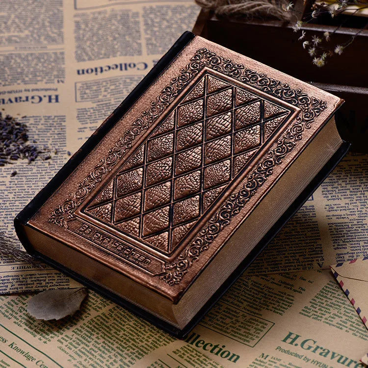 Embossed faux leather notebook with three-dimensional patterns in bronze or black gold colour