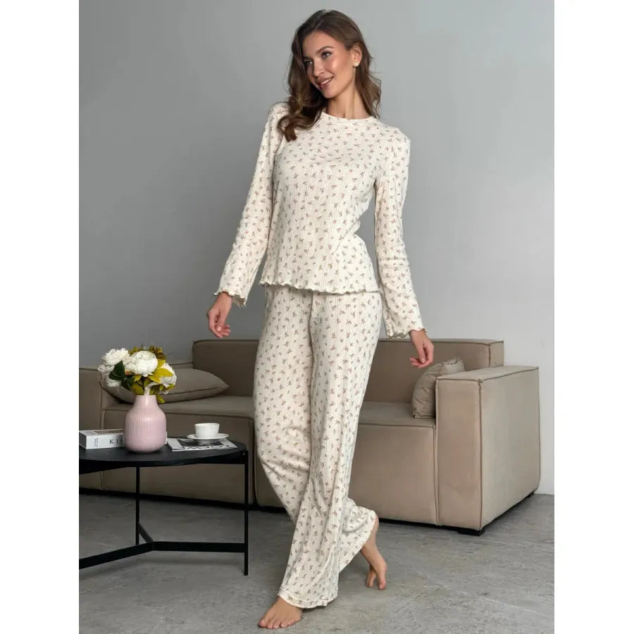White floral print women's lounge set with bell sleeve top and wide leg trousers