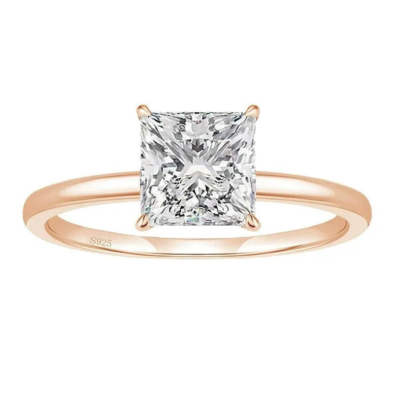Simple geometric women's ring in 925 silver with a round zirconia stone, shown in silver, gold, and rose gold finishes.