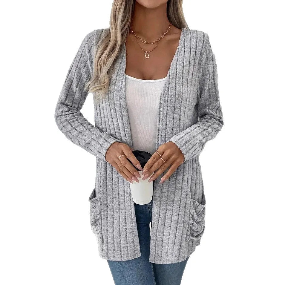 Long sleeve loose fit cardigan in solid colour with pockets, shown in black and granny grey.