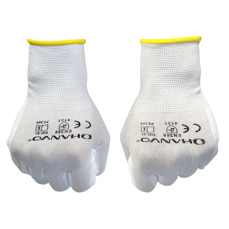 White PU coated labour gloves showing textured palm and flexible design, laid flat.