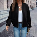 Black women's casual zip jacket with long sleeves and faux pockets