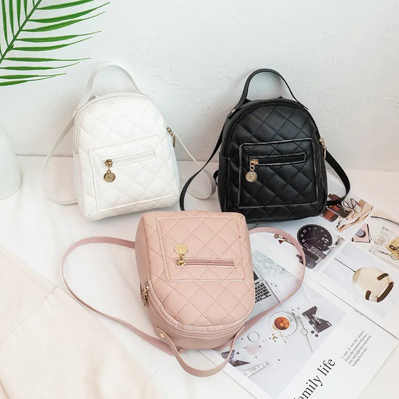 Girls' hard PU backpack with Korean embroidery in black, vertical square shape with soft carry handle