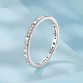 Silver I Love You password ring with oxidised black finish on a simple band, showing script engraving.