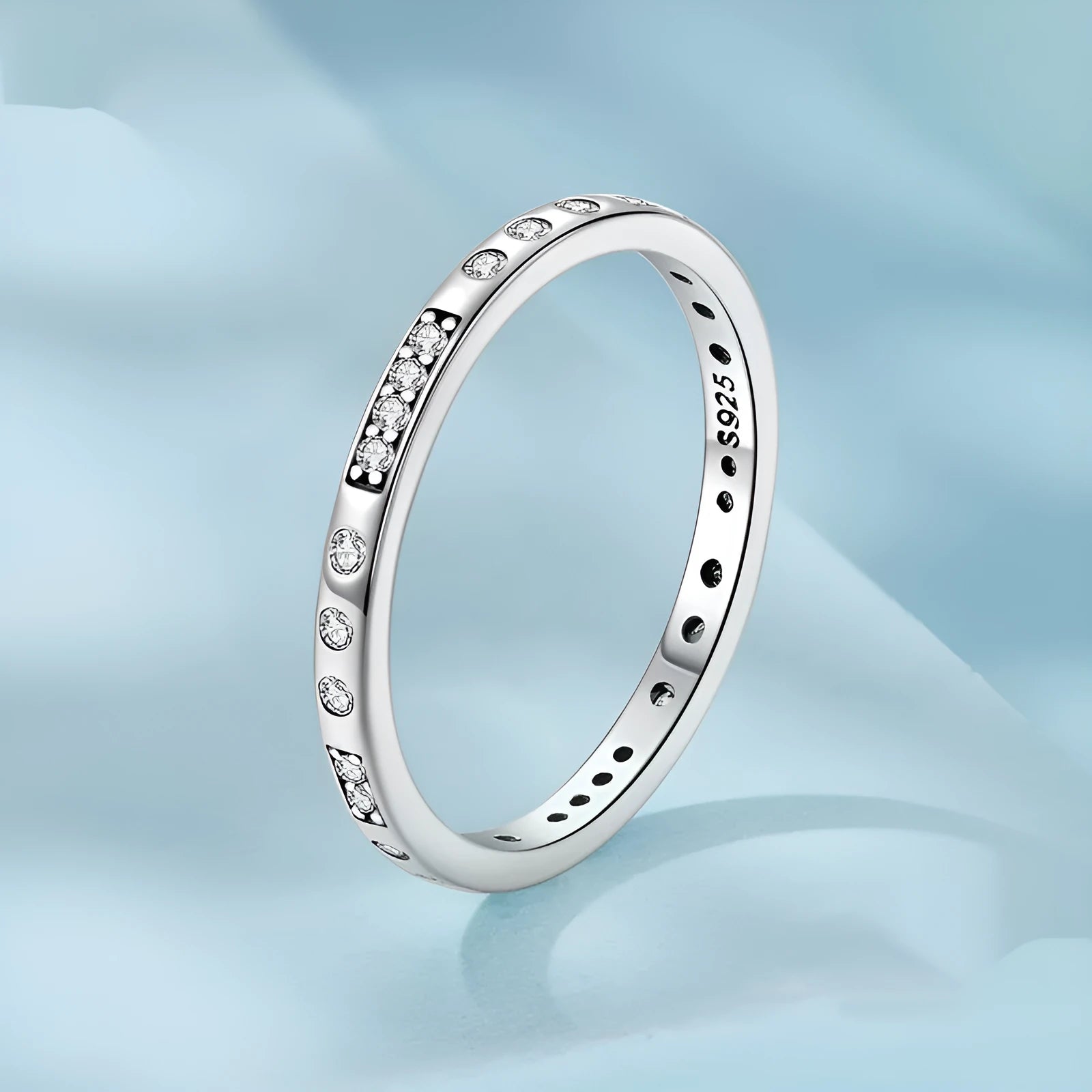Silver I Love You password ring with oxidised black finish on a simple band, showing script engraving.