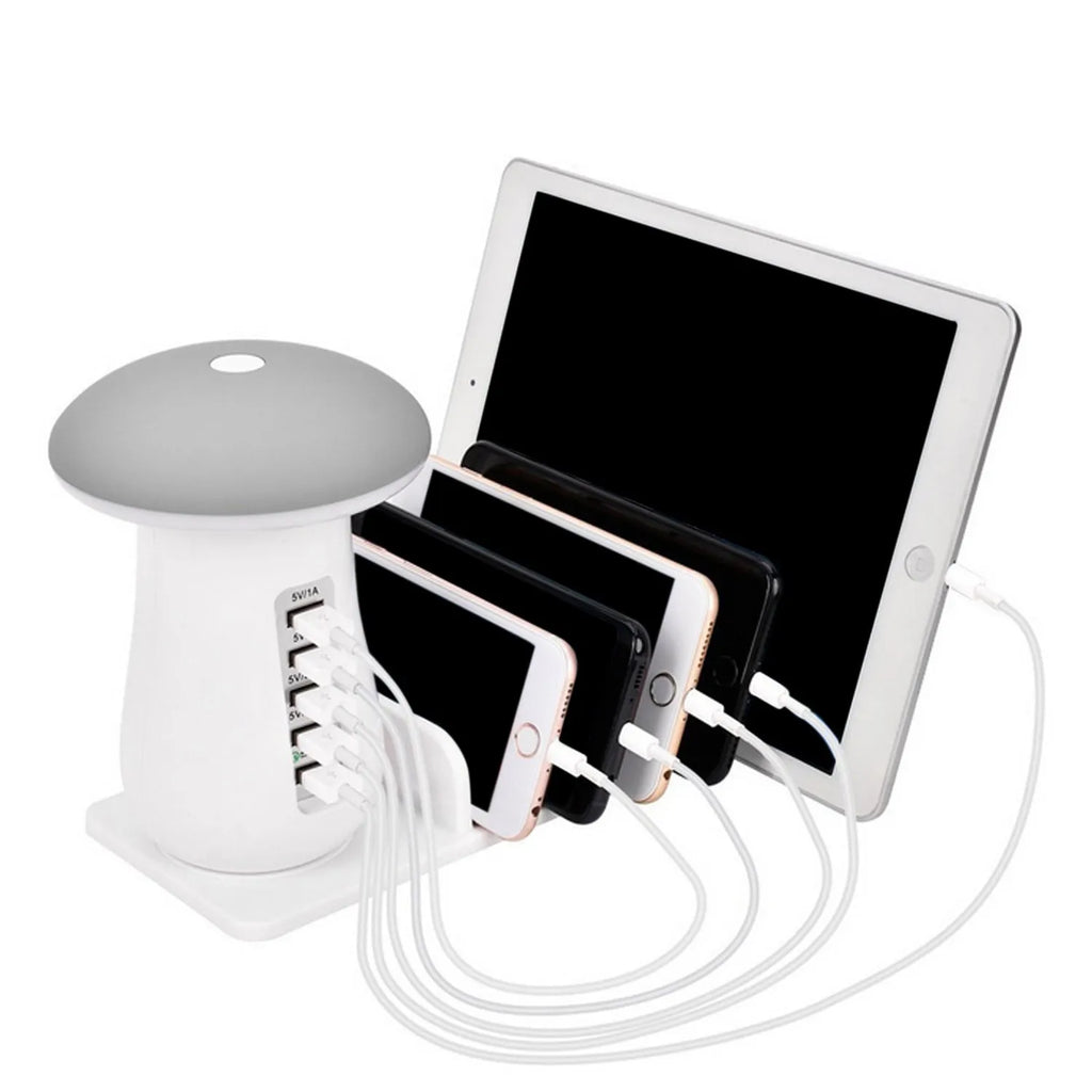 Mushroom-shaped white USB charging dock with 5 ports and integrated LED night lamp on desk