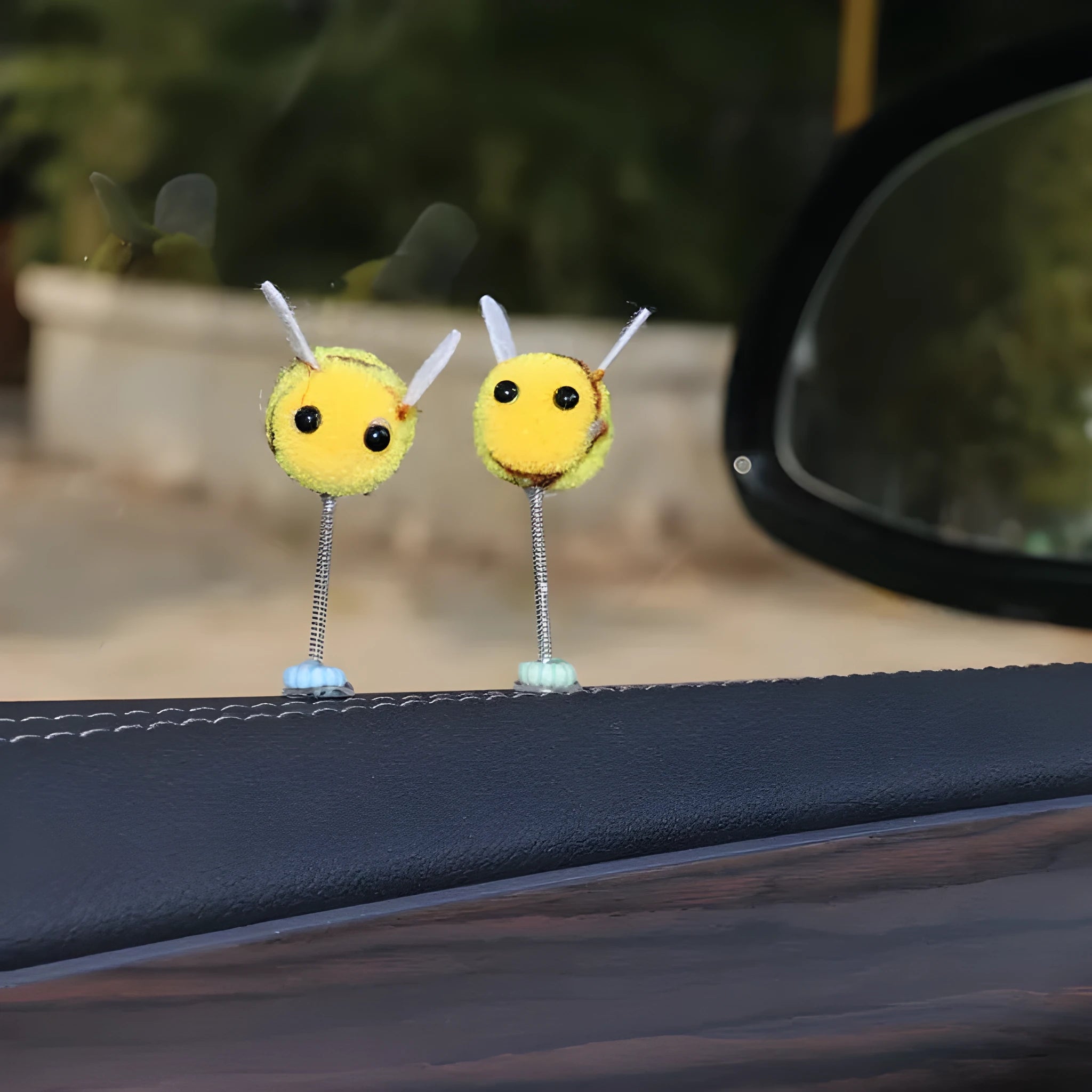 Swing Spring Bee car dashboard decoration showing cartoon bee design on fur ball material