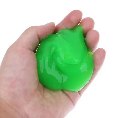 160g boxed blue magic cleaning gel universal cleaning mud on a wooden surface with dust specks