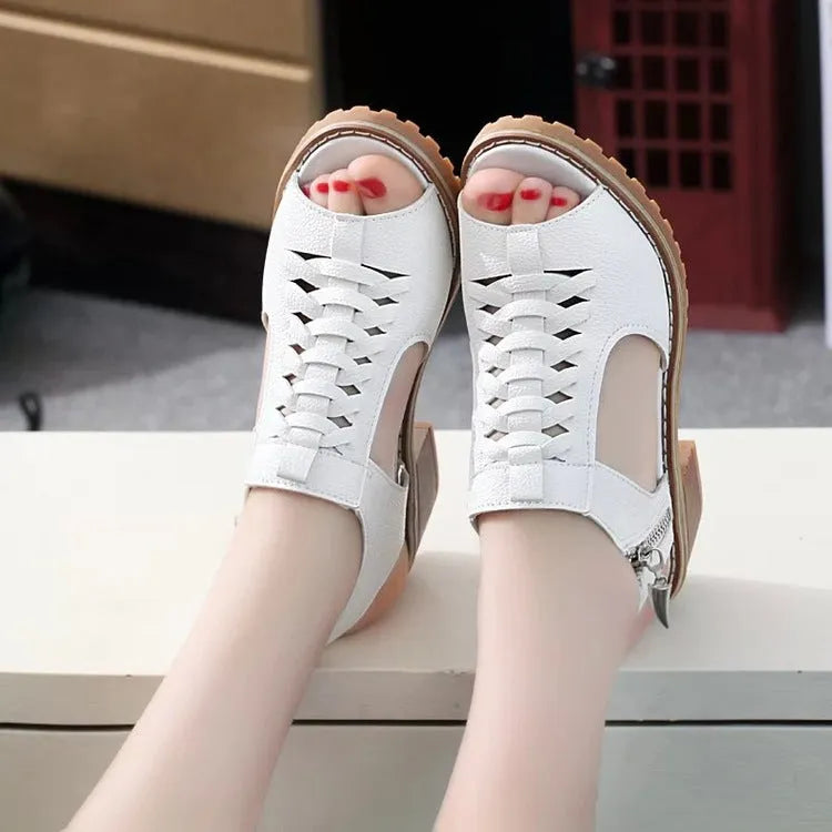 Retro style women's sandals with a side zip, middle heel, in black, creamy white, and white.