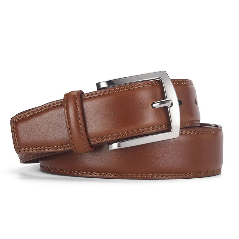 Men's black genuine leather belt with a silver alloy pin buckle on a flat surface