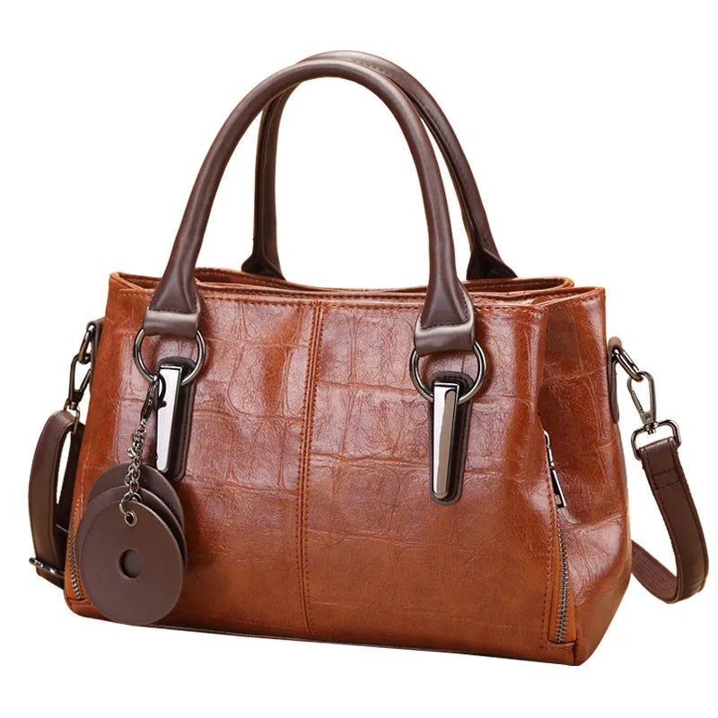 Horizontal square PU leather shoulder bag with single strap showing internal organiser compartments