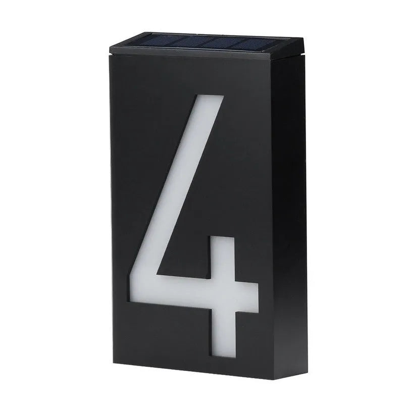 Solar powered house number light with LED illumination and waterproof housing for outdoor installation