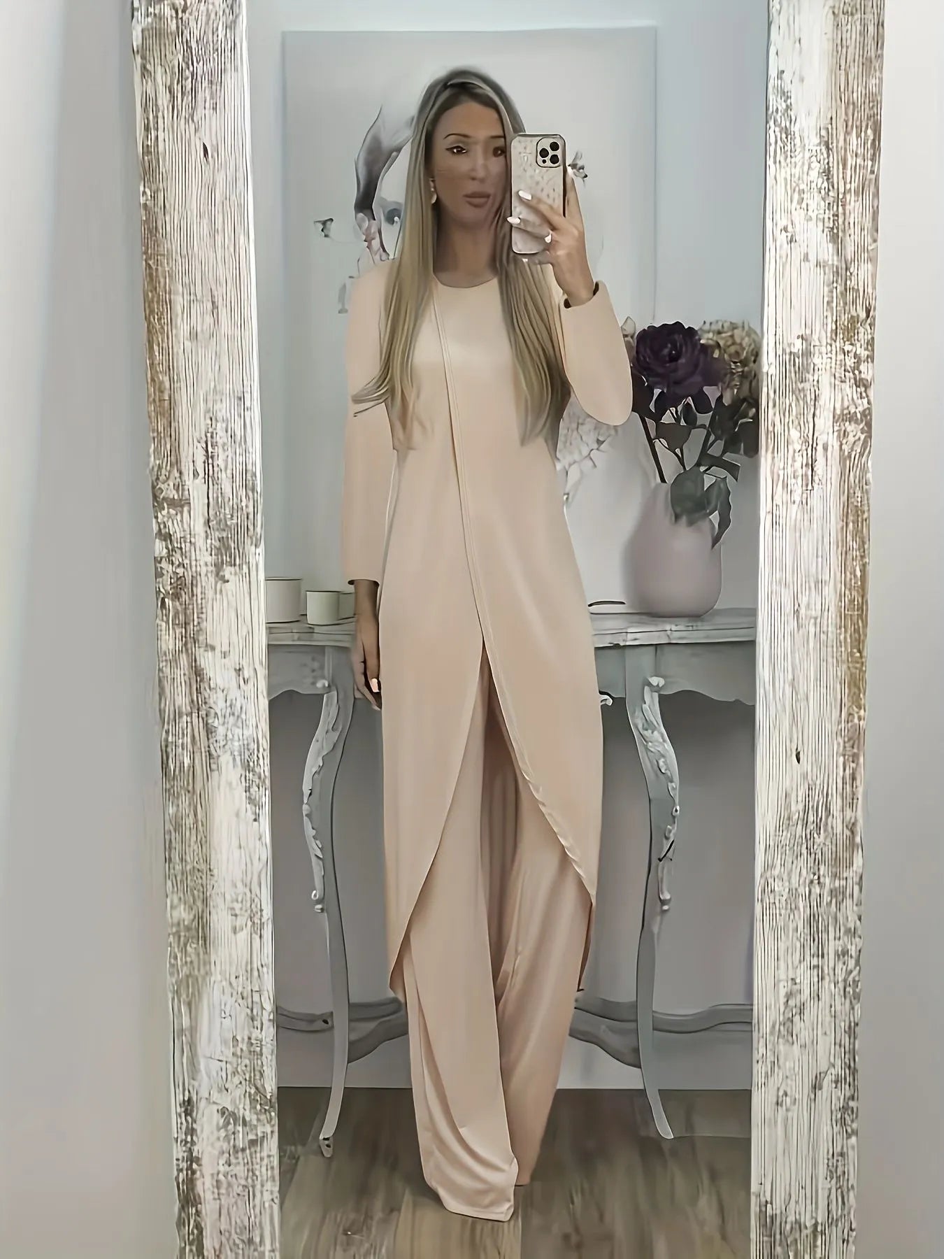A loose-fitting long sleeve two-piece lounge set in polyester, shown in khaki colour, consisting of a round-neck top and matching trousers.