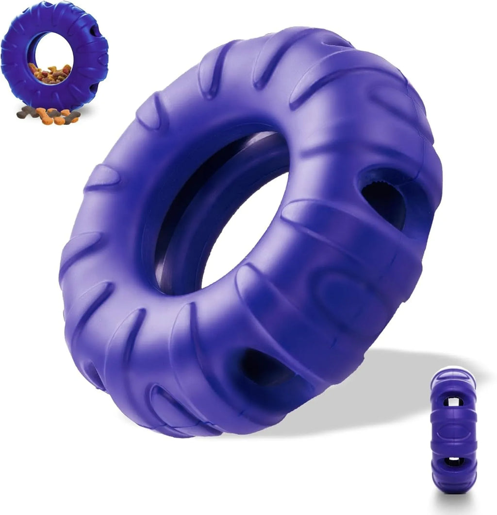 Blue rubber tyre-shaped dog chew toy with oval openings, shown next to dog treats.