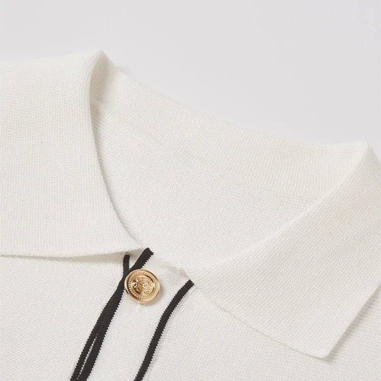 White women's cardigan with contrast lapels and short sleeves on hanger